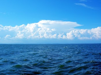 Blue sea and white sky.