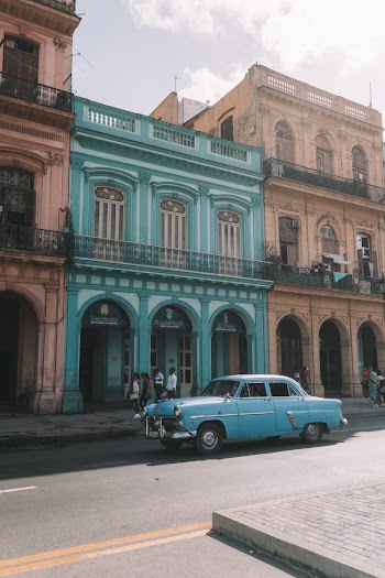 Blue Sedan on Road