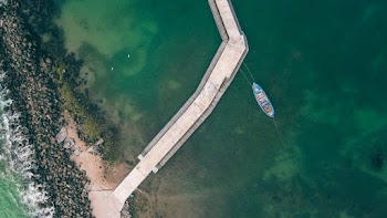 Blue Ship on Body of Wter