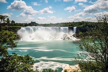 Blue Skies And Waterfalls