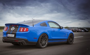 Blue Sports Coupe on Road