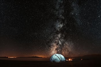blue tent under milkyway