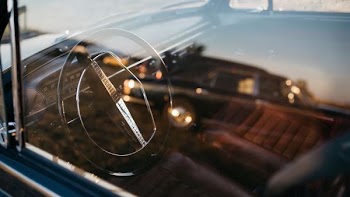 blue vehicle during daytime