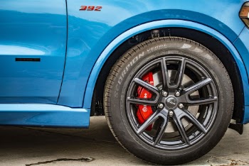 Blue Vehicle Wheel With Black Tire