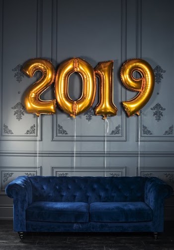 Blue Velvet Couch With Helium 2019 Balloons