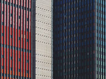 blue, white, and red commercial buildings