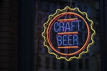 blue, yellow, and red Craft Beer lighted signage