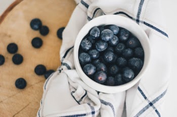 Blueberries on a plaid tea towel