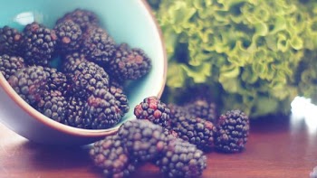 blur raspberries on table