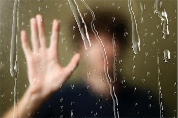 Blurred man behinds window with rain drops | Free stock photo | High Resolution image