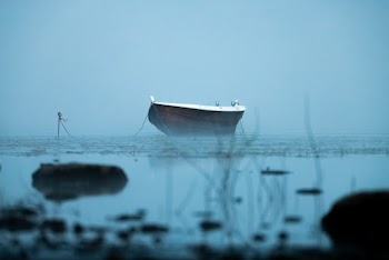 Boat Anchored in Water