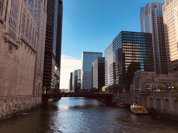 Boat Docked Near High Rise Buildings