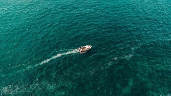 boat floating on body of water