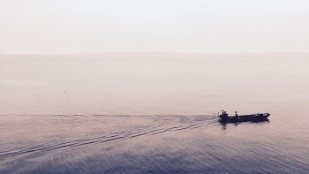 boat moving on body of water