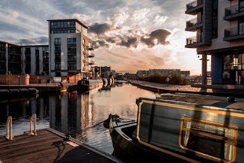 Boat on a Dock in an Urban City