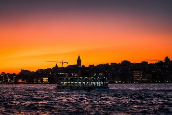 Boat on Body of Water during Sunset