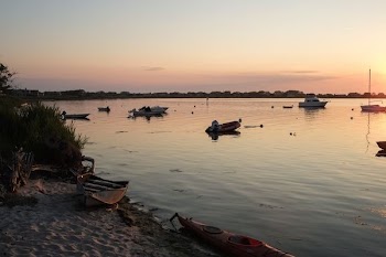 boat on lake during golden hour