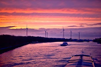 boat on river during sunset