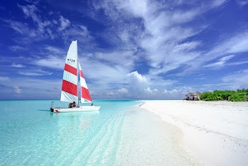 Boat on Water Near Seashore