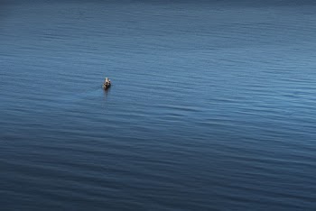 Boat Sailing On Body Of Water