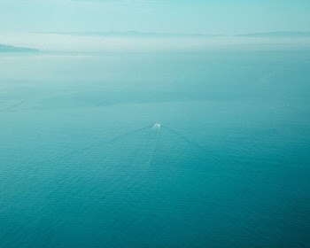 boat sailing through calm waters