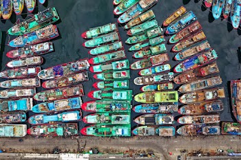 Boats Docked Near Pier