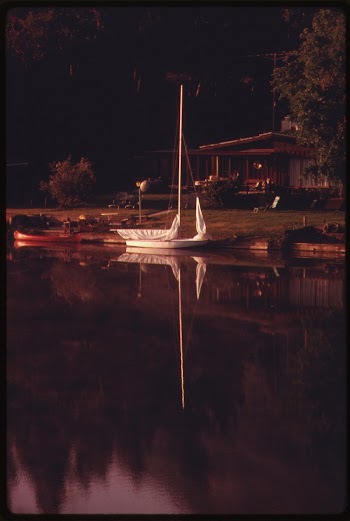 Boats in front of a home | Free Photo - rawpixel