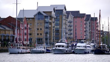Boats Near High-rise Buildings