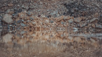 Body of Water And Rocks