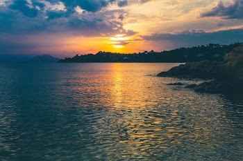 body of water beside shore
