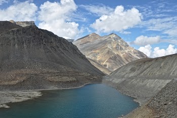 Body of Water Between Mountains