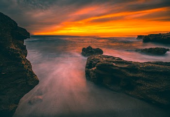 Body Of Water During Golden Hour