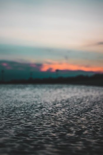 body of water during golden hour