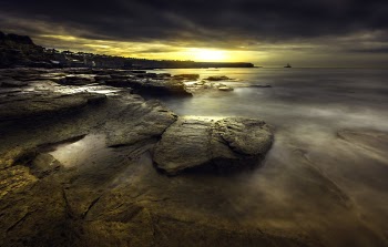Body Of Water During Golden Hour