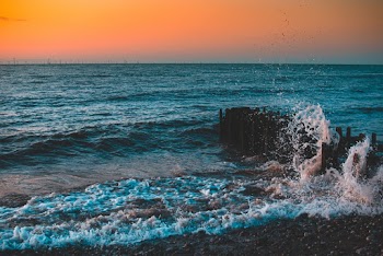 Body Of Water During Golden Hour