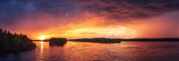 body of water during sunset