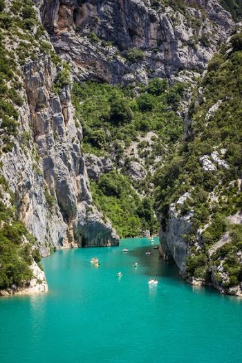 body of water in between mountain