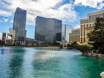 Body of Water Near Concrete Buildings