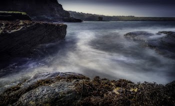 Body of Water Near Mountain