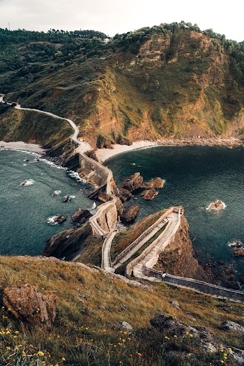 Body of Water Near Mountain
