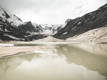 Body of Water Near Mountain