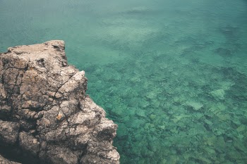 Body of Water Near Mountain