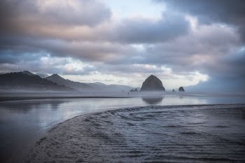 body of water near mountain