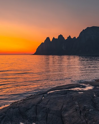 Body of Water Near Mountain