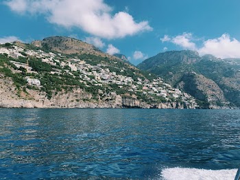 Body of Water Near Mountains