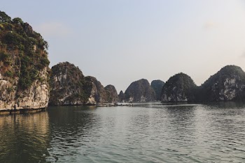 Body of Water Near Rock Formations