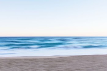 body of water near sand