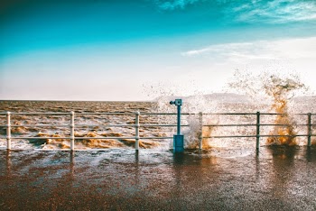 Body of Water Splashing on Rail