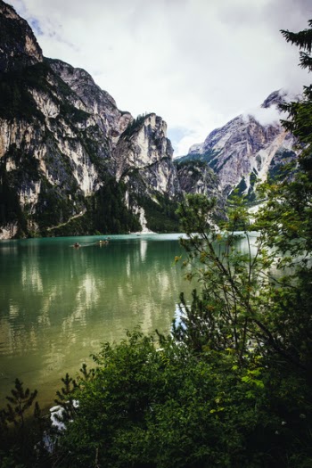 Body of Water Surrounded by Mountains