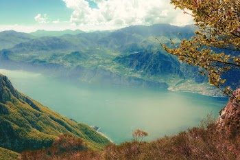 body of water surrounded with mountains